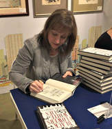 Yvonne signing at Books of Wonder